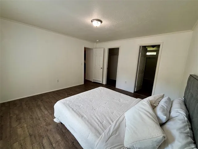 a view of room with hardwood floor