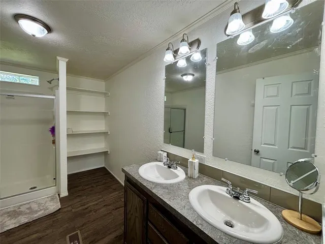 a bathroom with a toilet and a vanity