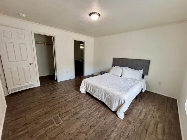 a bathroom with a sink double vanity and a mirror