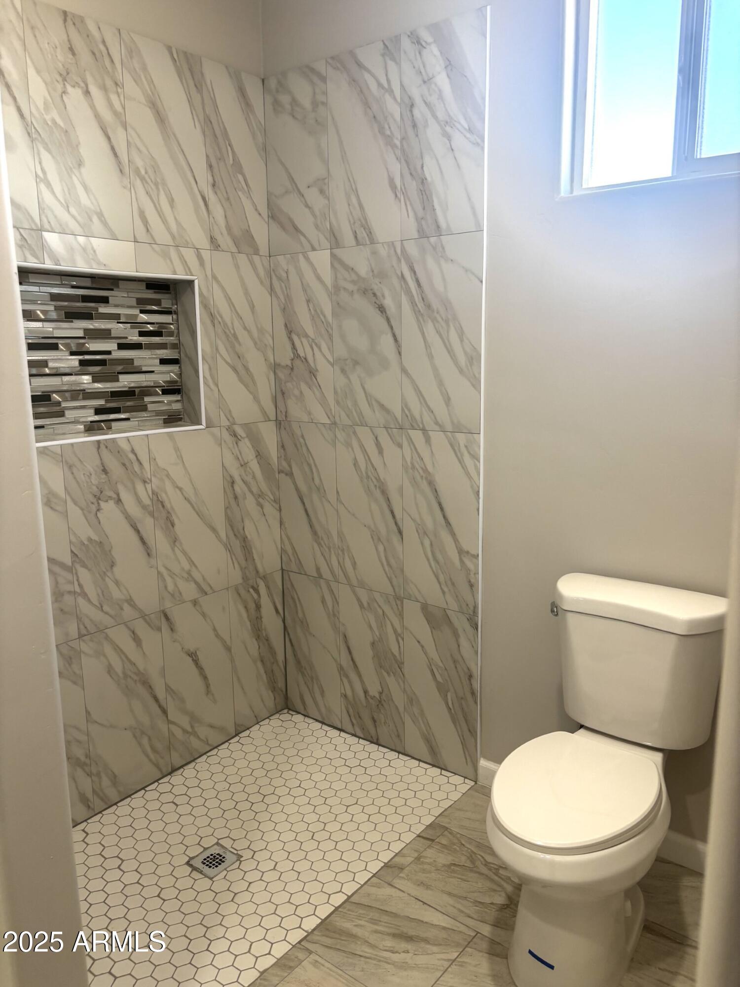 3440 Camino Del Rancho Douglas, AZ 85607 - Photo 12 of 17 a bathroom with a toilet