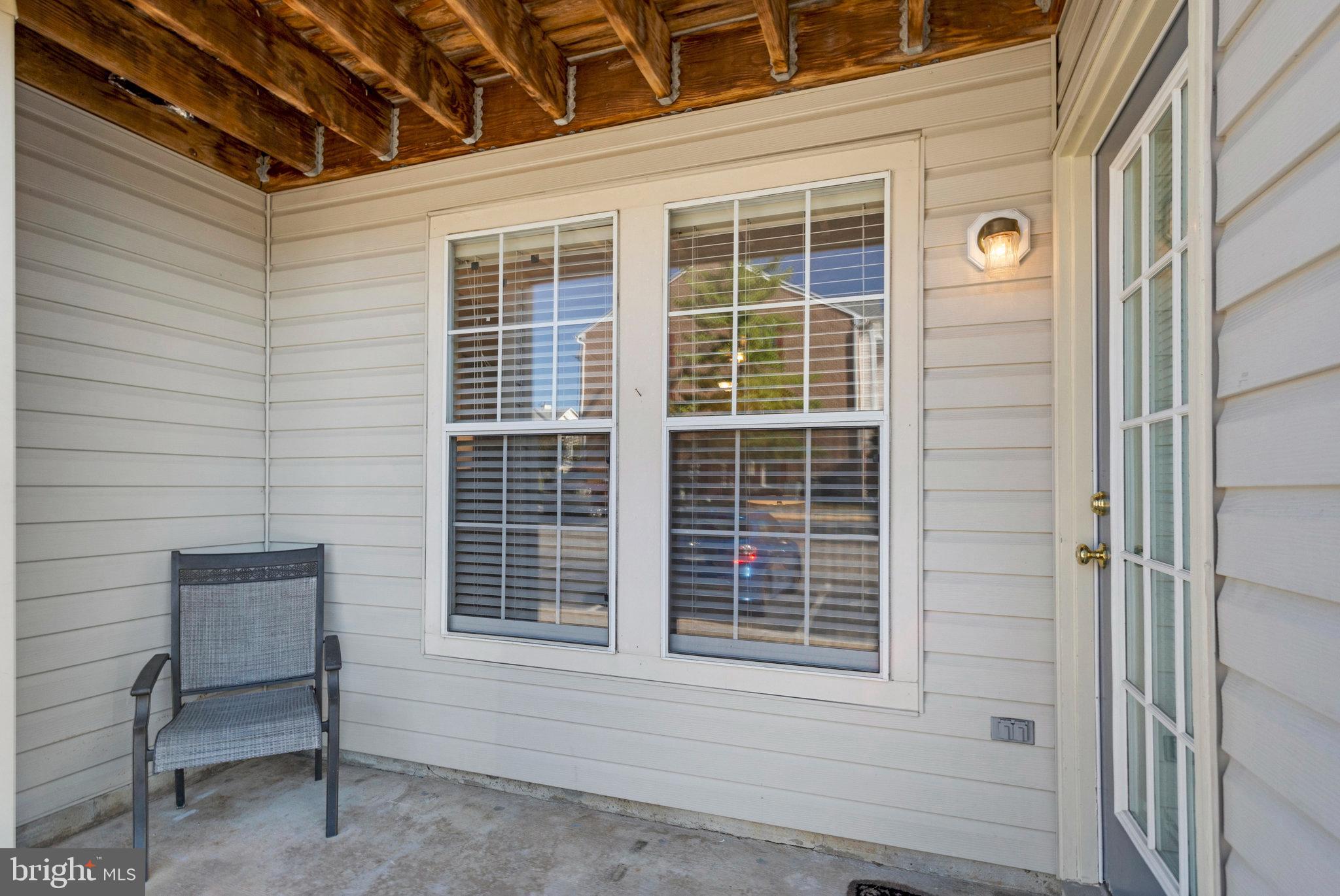 691 Winding Stream Way, Unit 104 Odenton, MD 21113 - Photo 2 of 33 Front Patio with Private Entrance