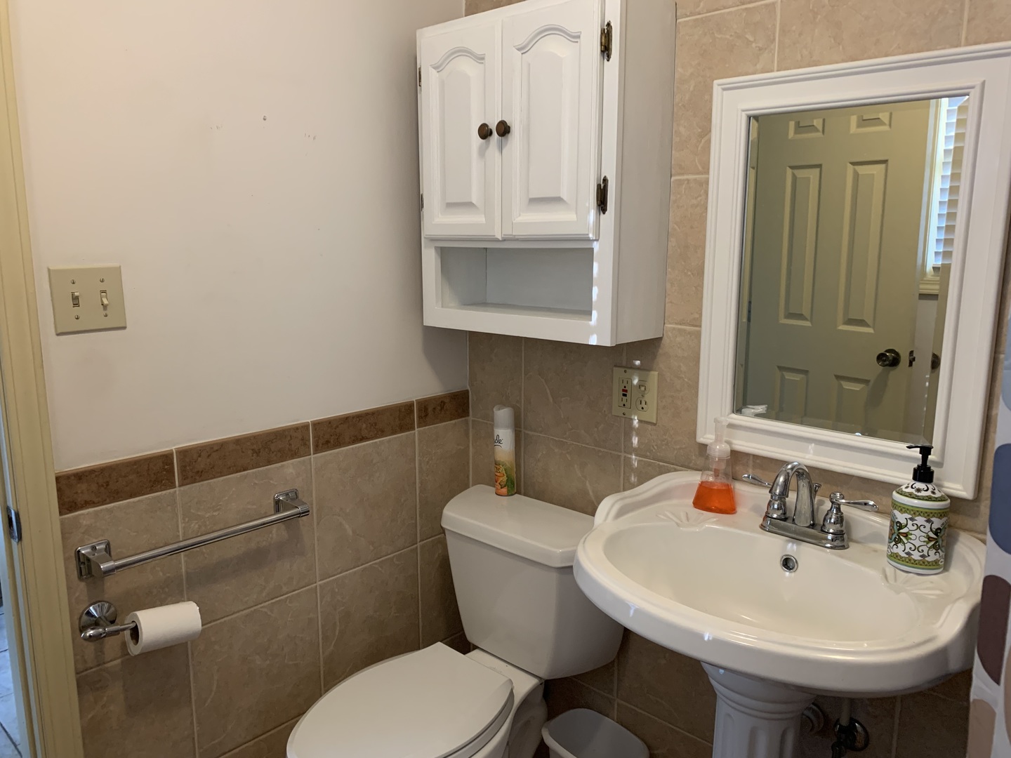 501 Crestview Drive Fox River Grove, IL 60021 - Photo 15 of 23 a bathroom with a sink a toilet and mirror