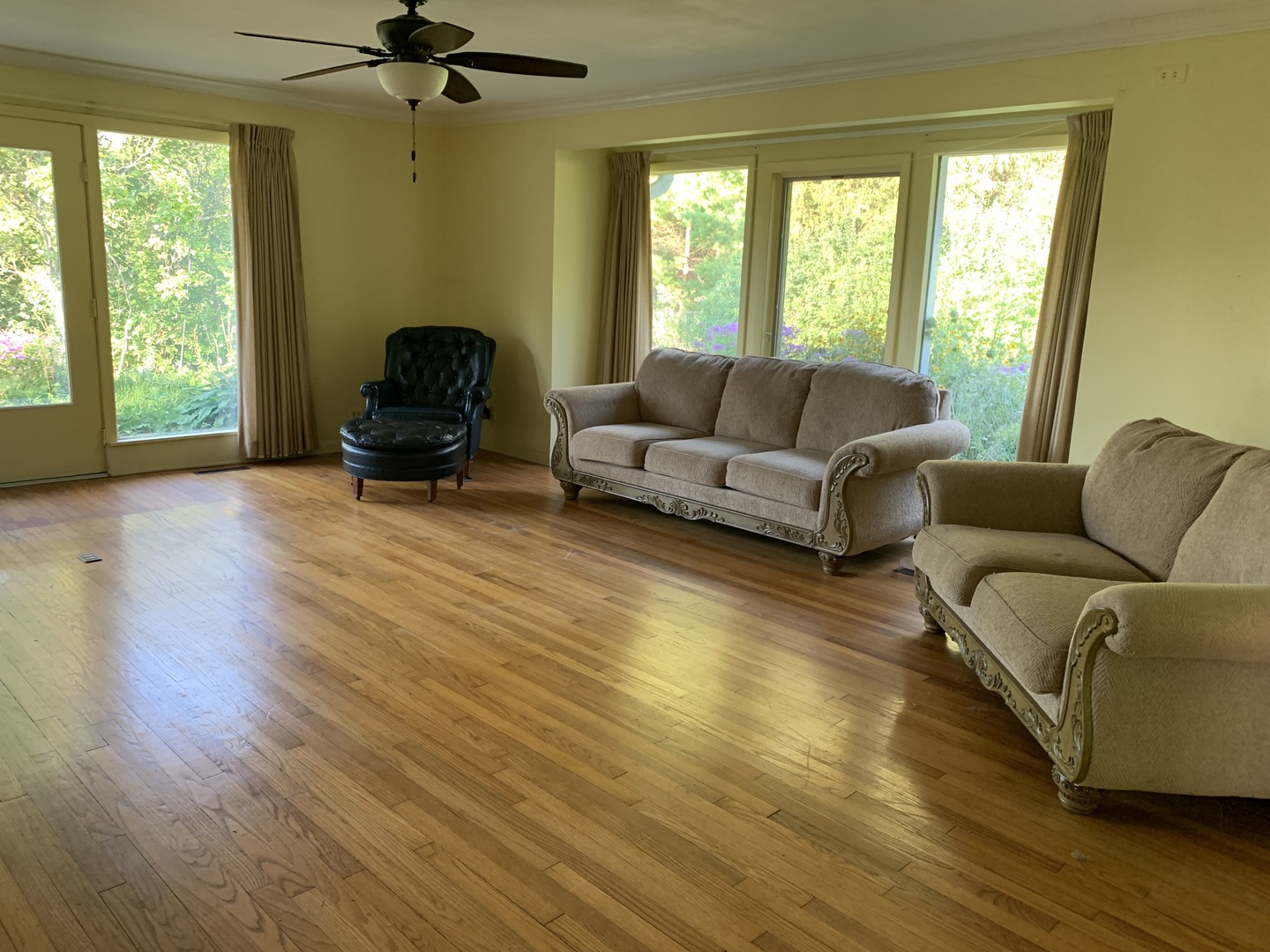 501 Crestview Drive Fox River Grove, IL 60021 - Photo 8 of 23 a living room with furniture and a large window
