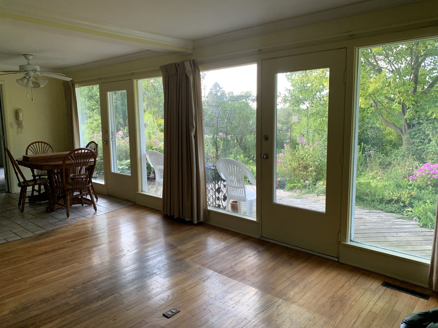 501 Crestview Drive Fox River Grove, IL 60021 - Photo 9 of 23 a view of a dining room with furniture and wooden floor