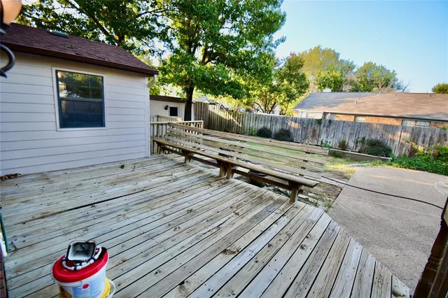 a swimming pool with outdoor seating and yard