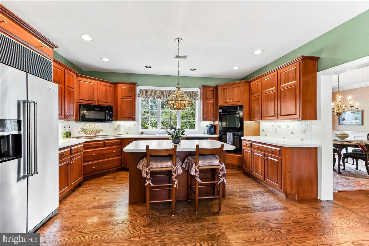 7 Bolingbroke Road West Chester, PA 19382 - Photo 23 of 86 Warm wood tones in a spacious kitchen.