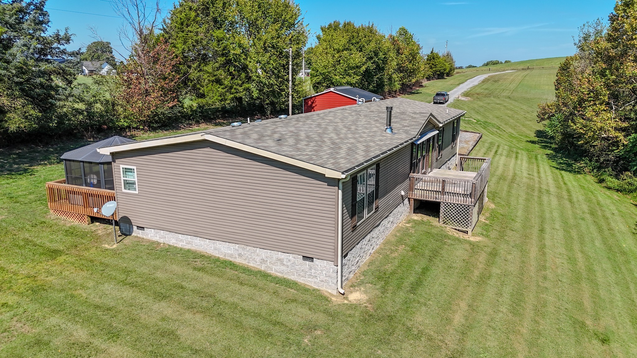 137 Hawkins Road Westmoreland, TN 37186 - Photo 4 of 71 a aerial view of a house with swimming pool and sitting area
