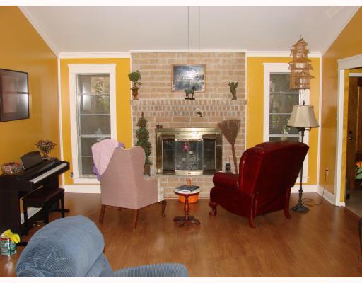 206 Seco Drive Portland, TX 78374 - Photo 3 of 10 a living room with furniture and a fireplace