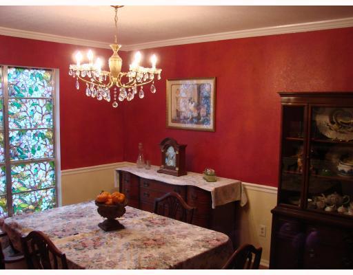 206 Seco Drive Portland, TX 78374 - Photo 5 of 10 a room with chandelier fan and wooden floor