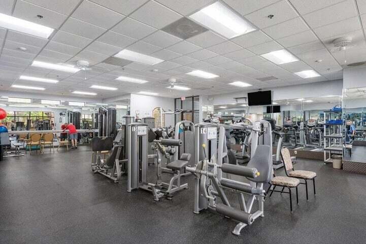 10110 Cedar Point Boulevard, Unit 203 Boynton Beach, FL 33437 - Photo 23 of 37 a view of a room with gym equipment