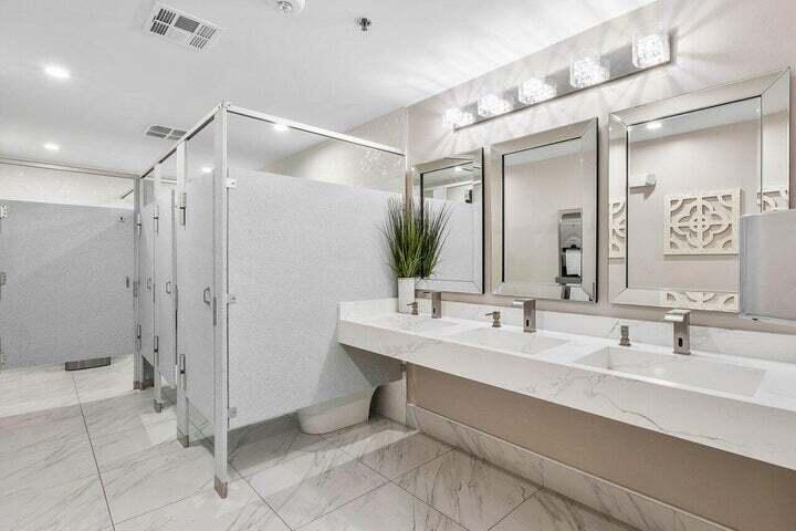 10110 Cedar Point Boulevard, Unit 203 Boynton Beach, FL 33437 - Photo 32 of 37 a bathroom with a double vanity sink mirror and shower