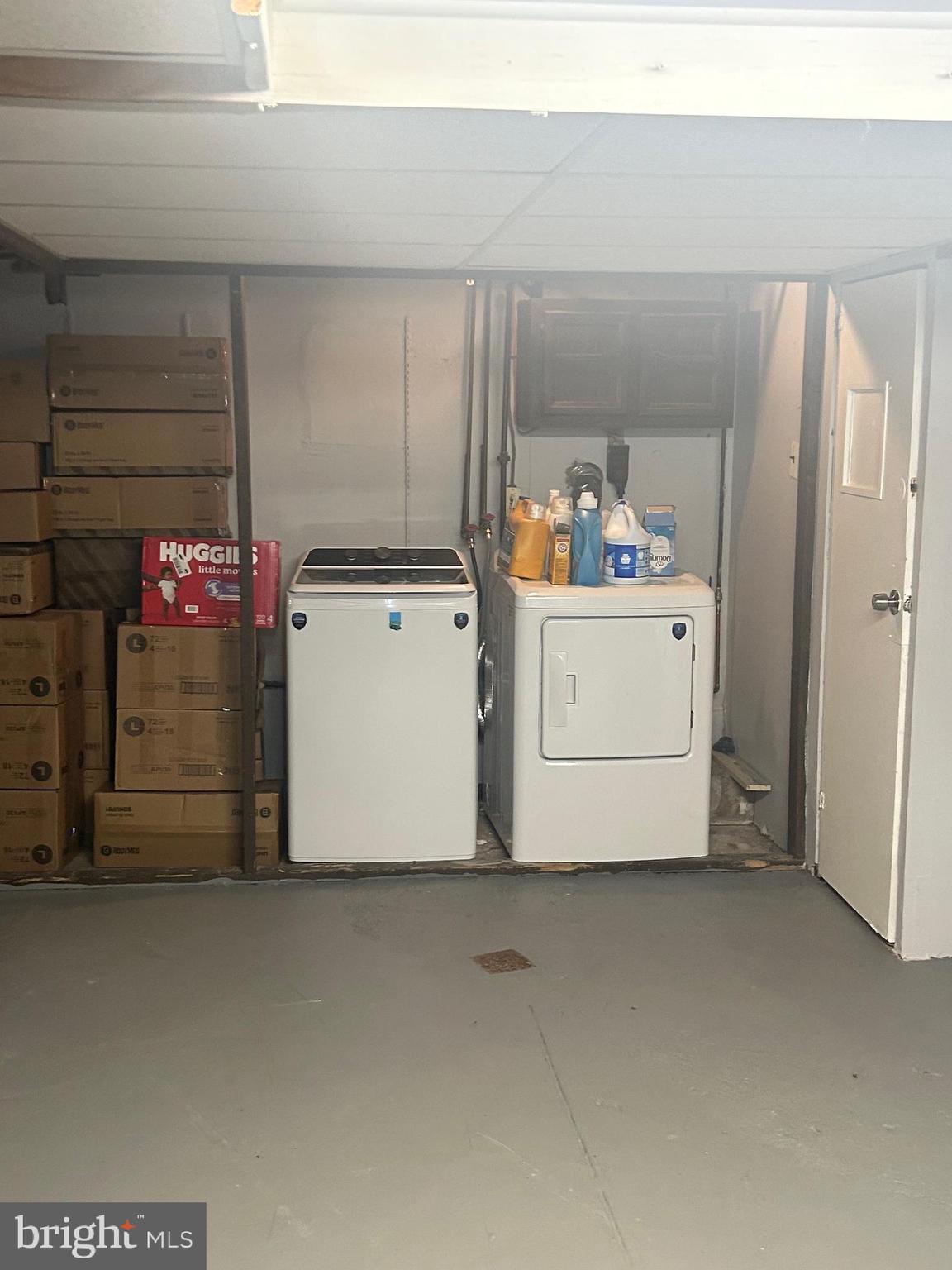306 Golf Road Darby, PA 19023 - Photo 13 of 14 a utility room with dryer and washer