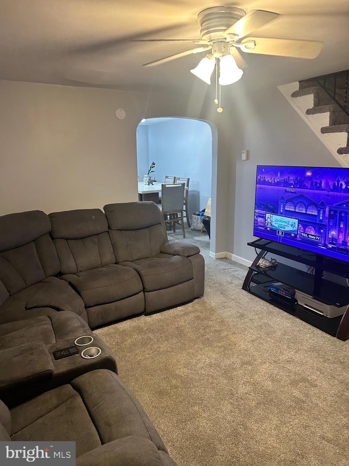306 Golf Road Darby, PA 19023 - Photo 2 of 14 a living room with furniture and a chandelier