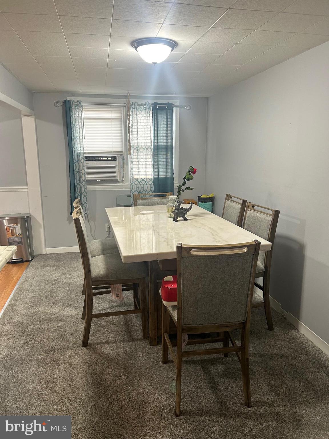 306 Golf Road Darby, PA 19023 - Photo 4 of 14 a view of a dining room with furniture and window