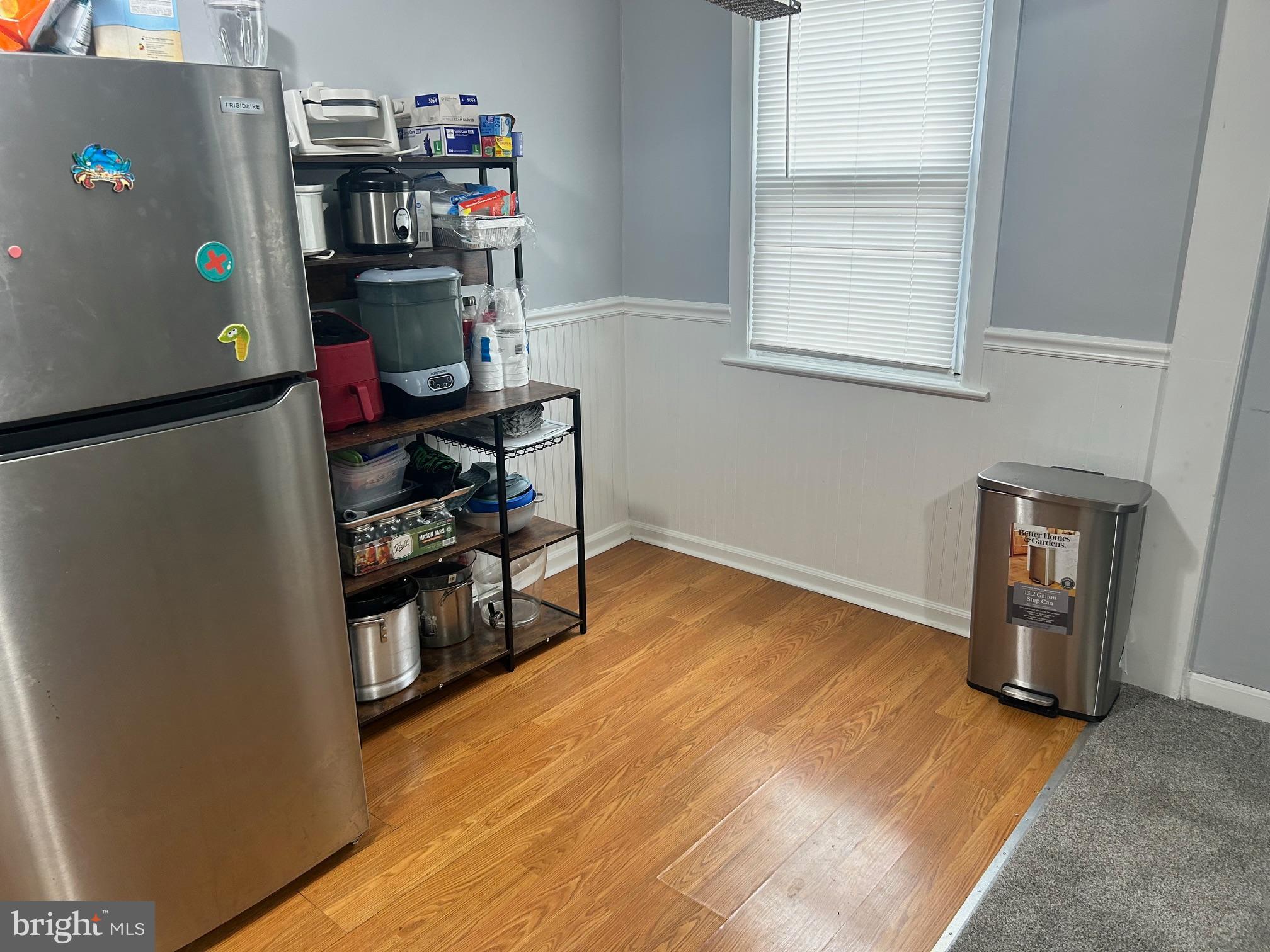 306 Golf Road Darby, PA 19023 - Photo 7 of 14 a view of a workspace with furniture and a window