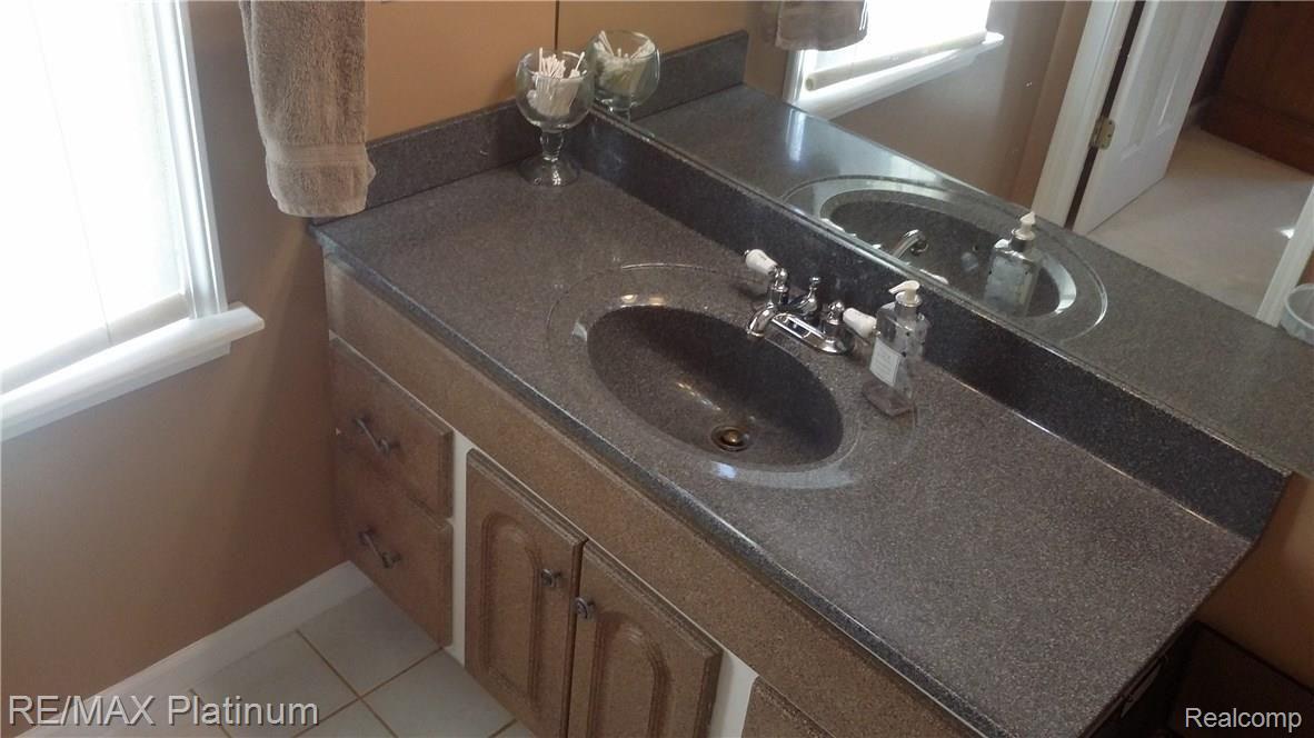 1383 North Hacker Road Howell, MI 48843 - Photo 21 of 34 master bathroom
