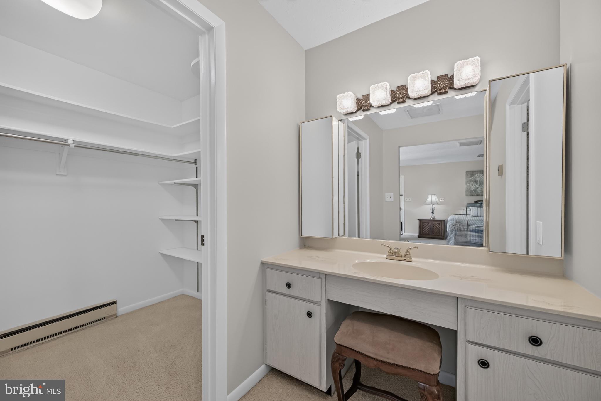 4212 Dustin Road Burtonsville, MD 20866 - Photo 28 of 65 Elegant bathroom with ample storage.