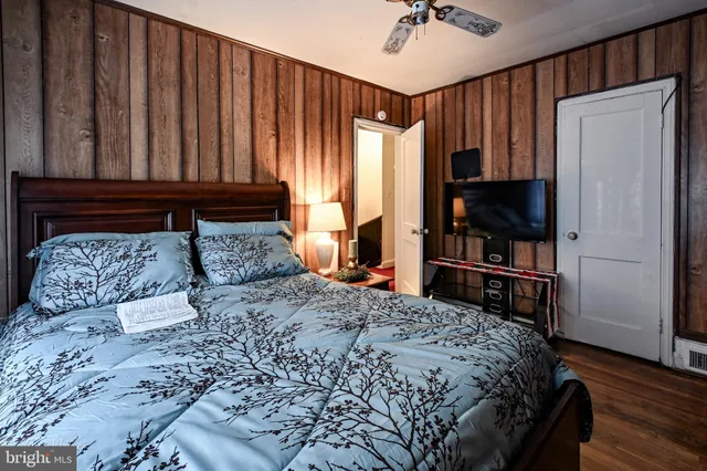 a bathroom with a sink a toilet and shower curtain