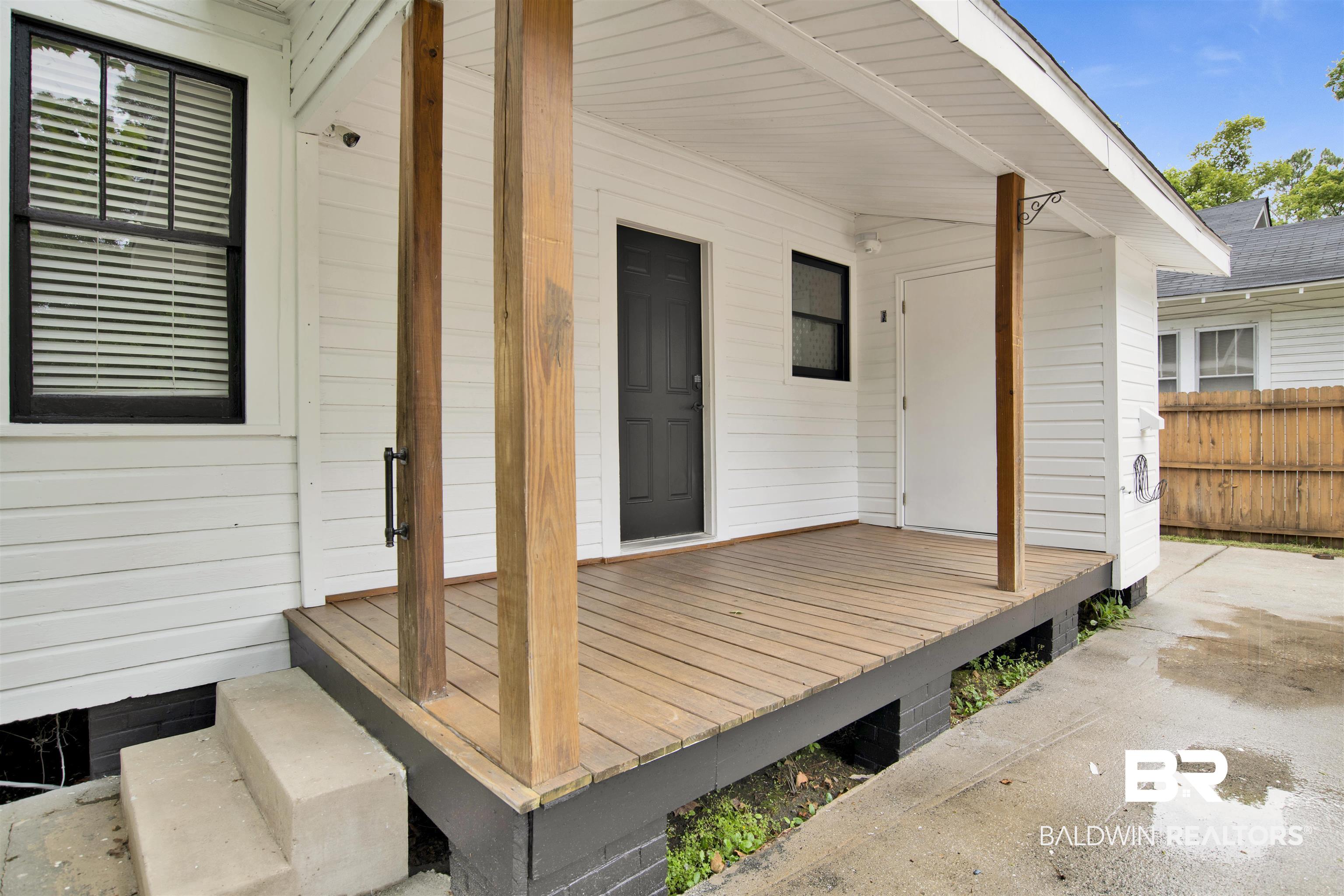 507 Holcombe Avenue Mobile, AL 36606 - Photo 10 of 28 Deck featuring fence