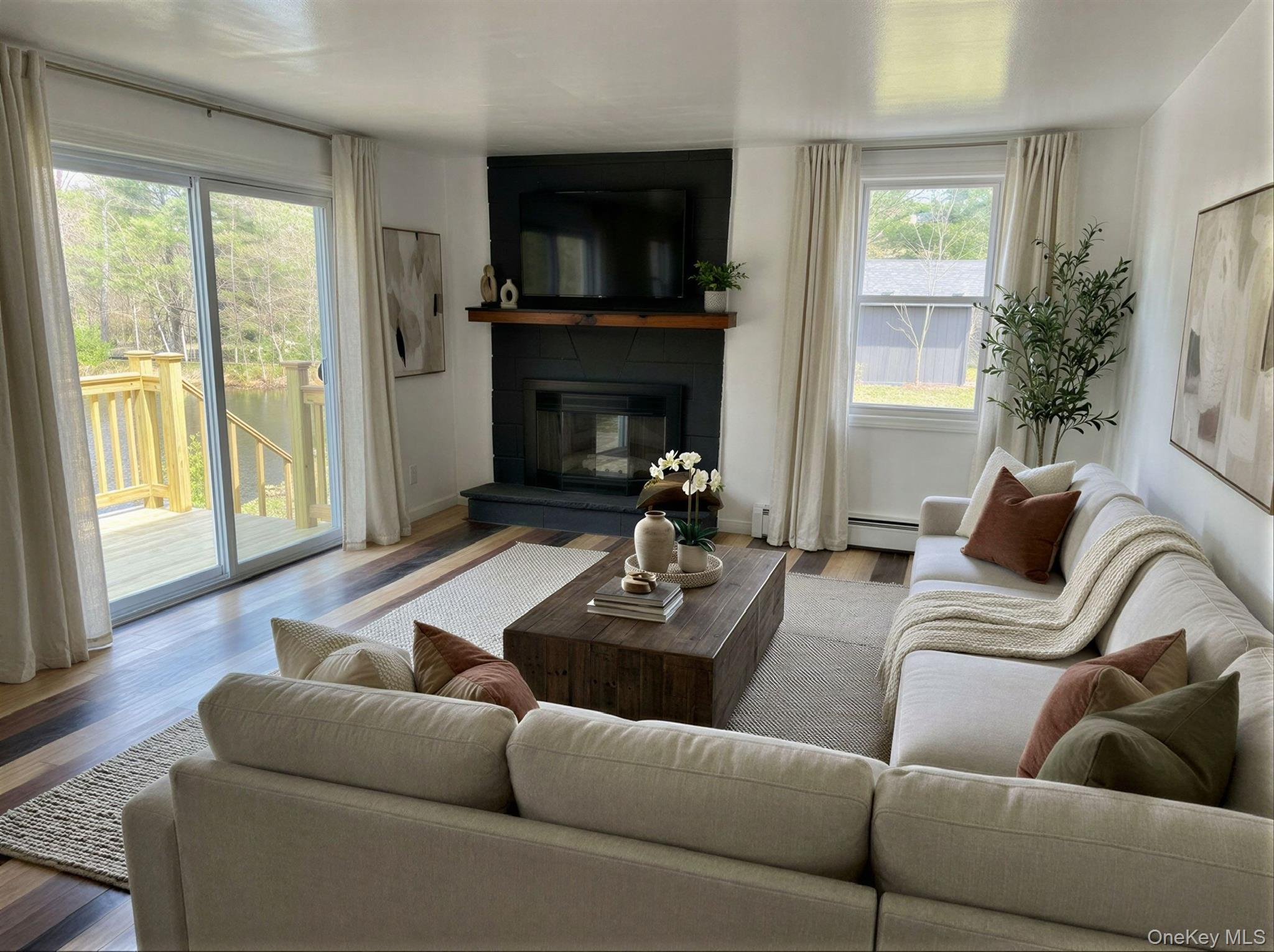 273 Blind Pond Road Narrowsburg, NY 12764 - Photo 11 of 29 a living room with furniture and a fireplace