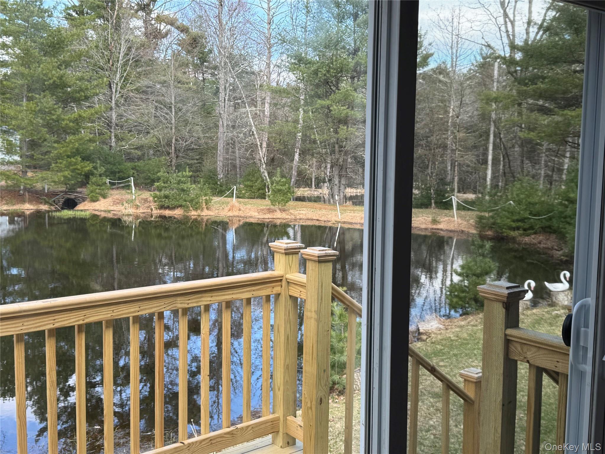 273 Blind Pond Road Narrowsburg, NY 12764 - Photo 13 of 29 a view of a balcony with lake view