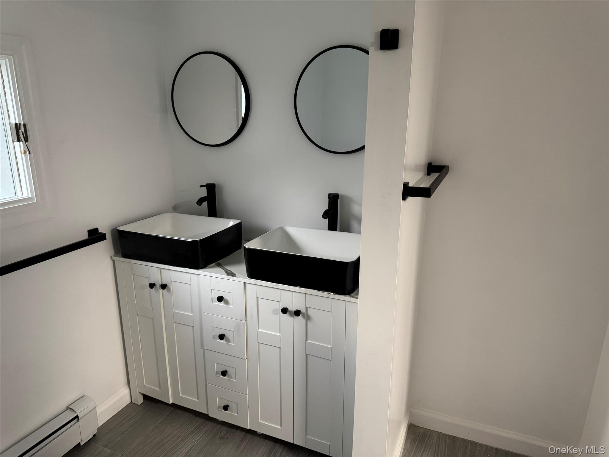 273 Blind Pond Road Narrowsburg, NY 12764 - Photo 18 of 29 a bathroom with a sink and a mirror