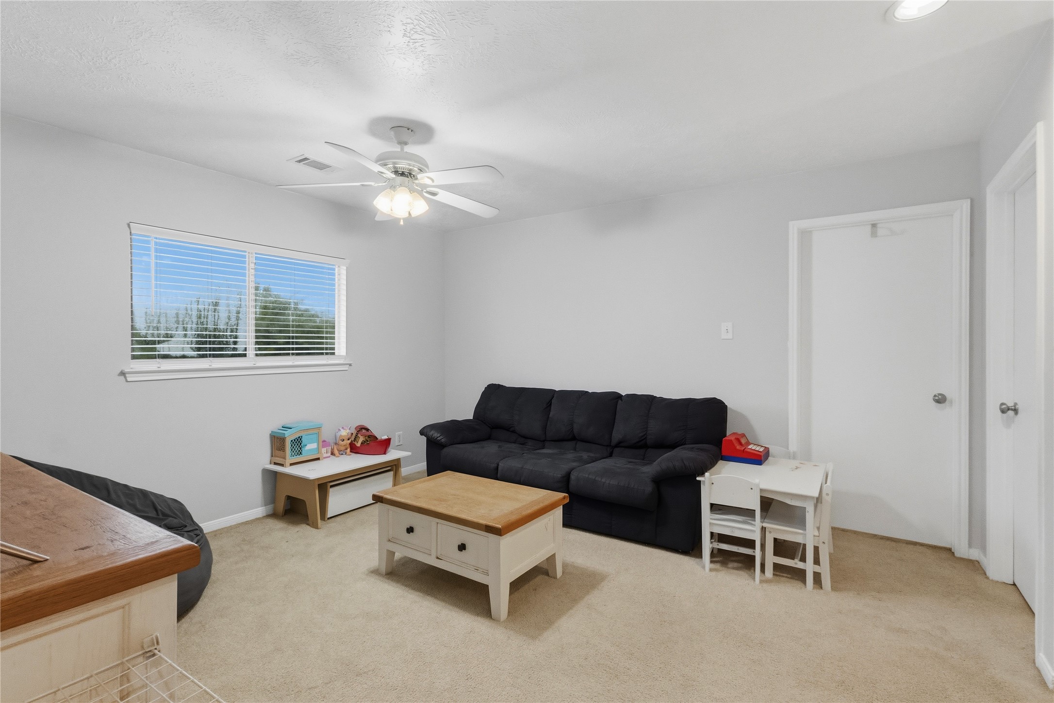 2703 Hidden Spring Vale Drive Spring, TX 77386 - Photo 13 of 29 The game room, situated at the top of the stairs, serves as a lively hub between the bedrooms.