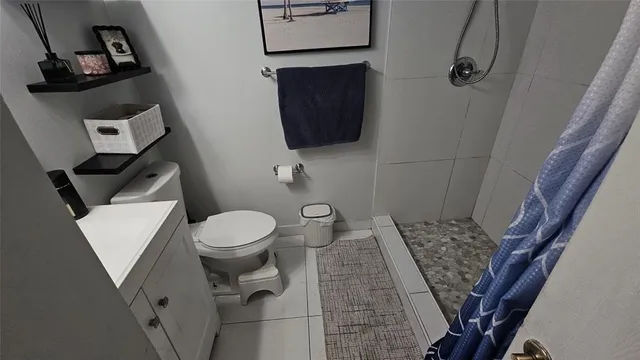 a bathroom with a toilet and a sink