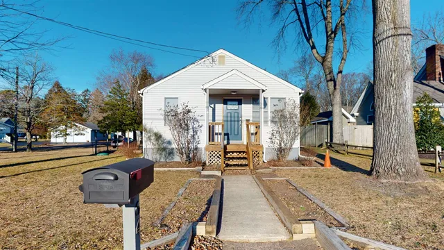 a front view of a house with outdoor space
