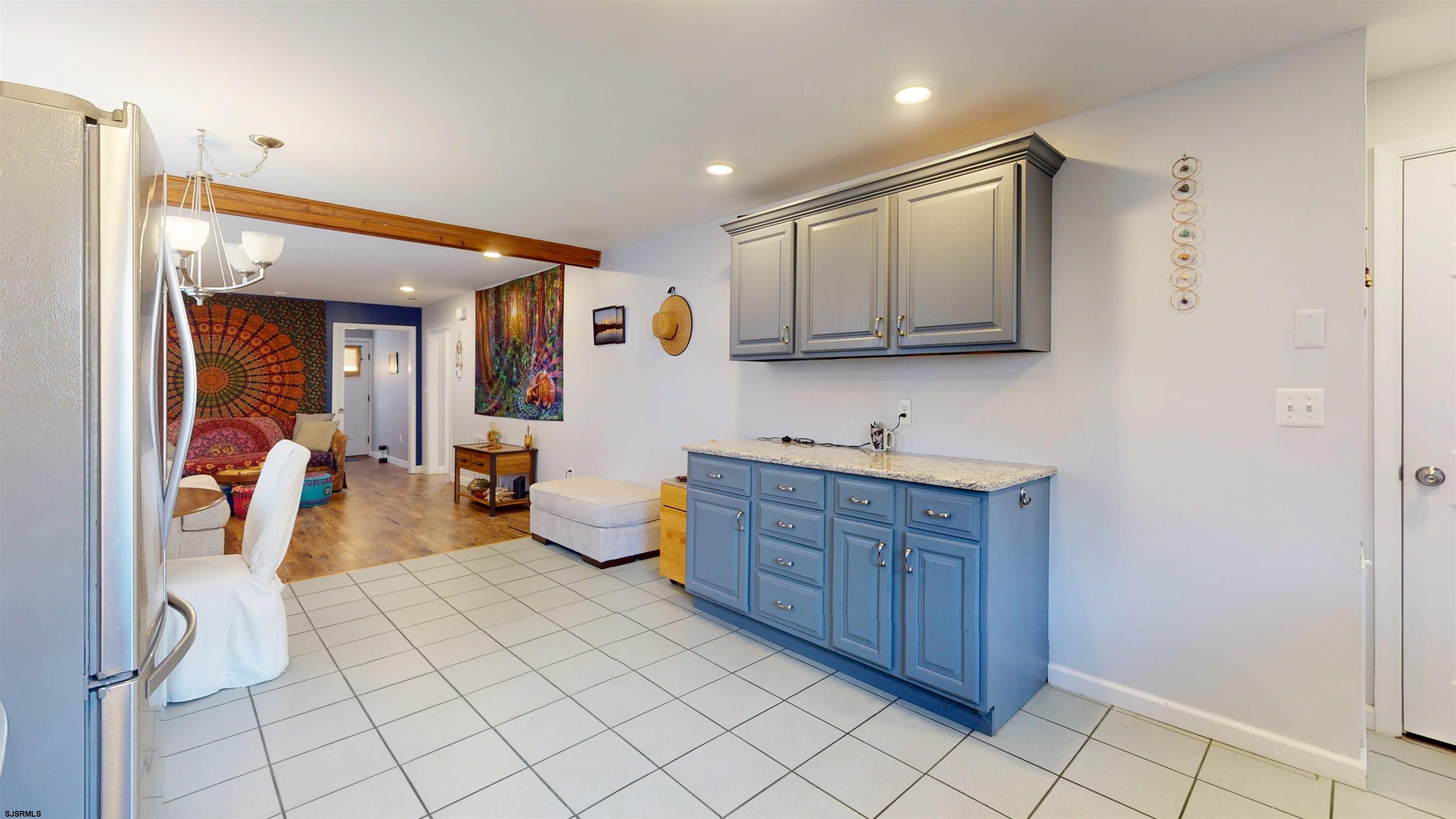 64 Clarks Landing Road Port Republic, NJ 08241 - Photo 15 of 63 a spacious bathroom with a sink a mirror and shower