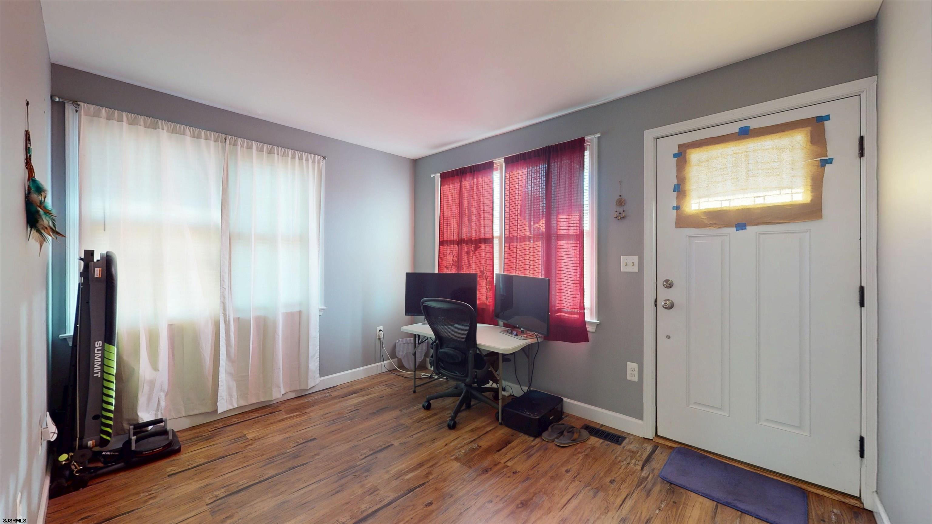 64 Clarks Landing Road Port Republic, NJ 08241 - Photo 18 of 63 a view of a workspace with furniture and a window
