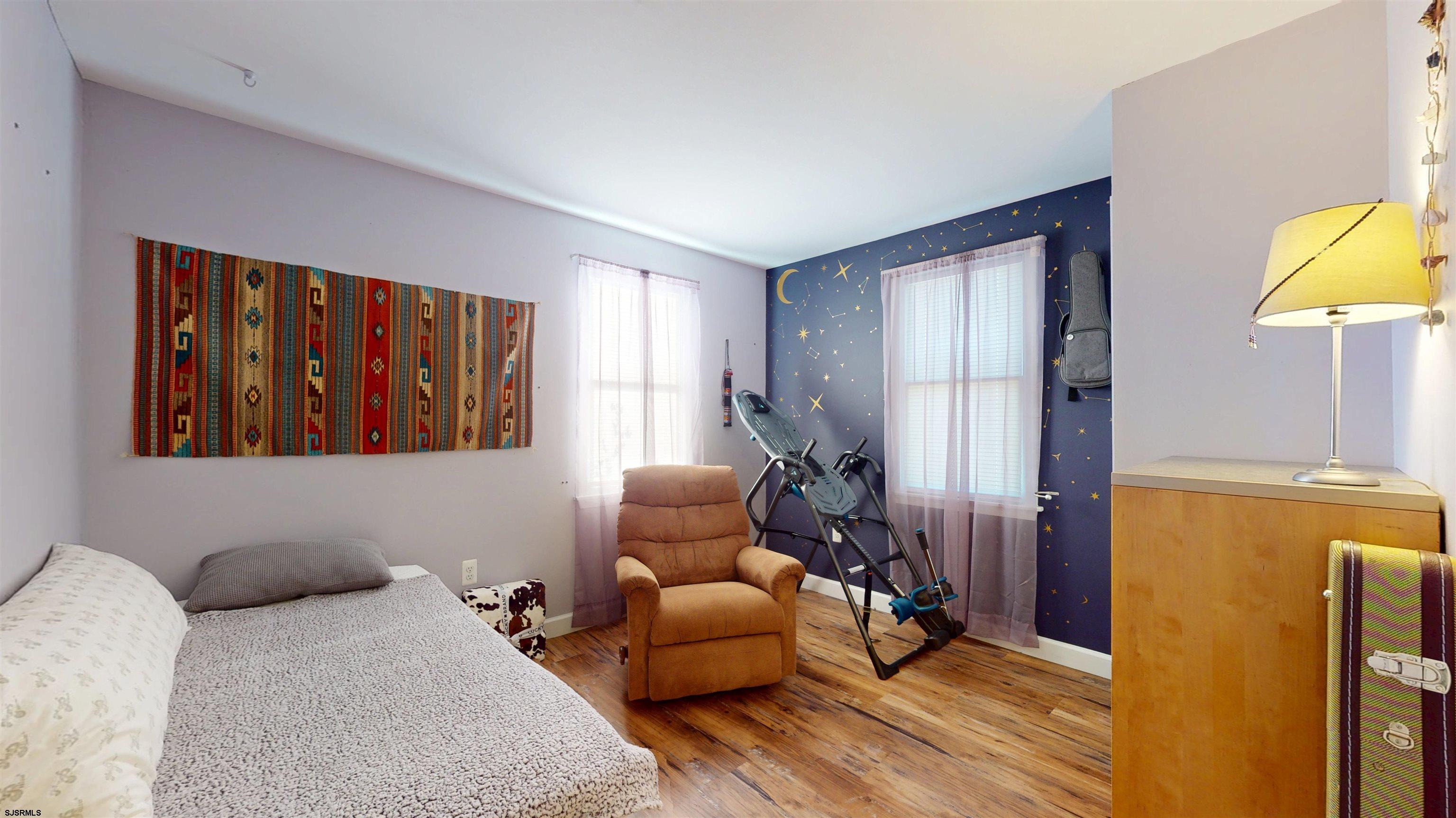 64 Clarks Landing Road Port Republic, NJ 08241 - Photo 21 of 63 a bedroom with furniture and a window