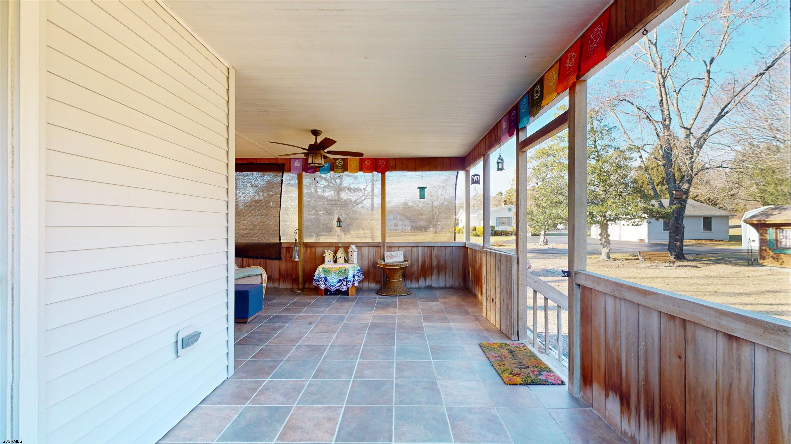64 Clarks Landing Road Port Republic, NJ 08241 - Photo 3 of 63 a very nice looking room with a large window and a fireplace