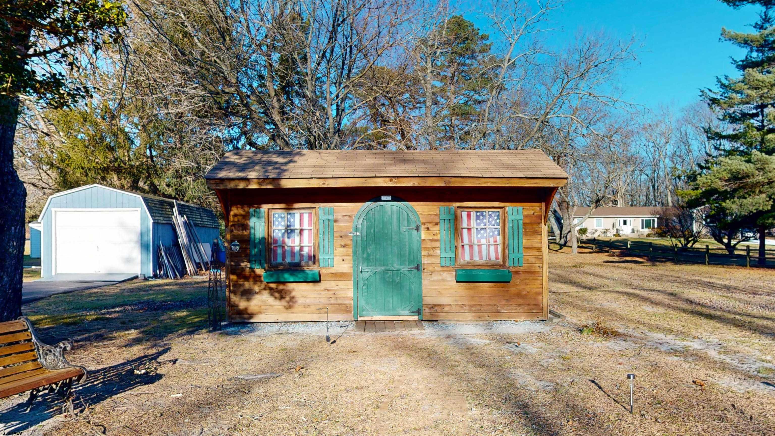 64 Clarks Landing Road Port Republic, NJ 08241 - Photo 31 of 63 an outdoor space with seating area and yard with furniture