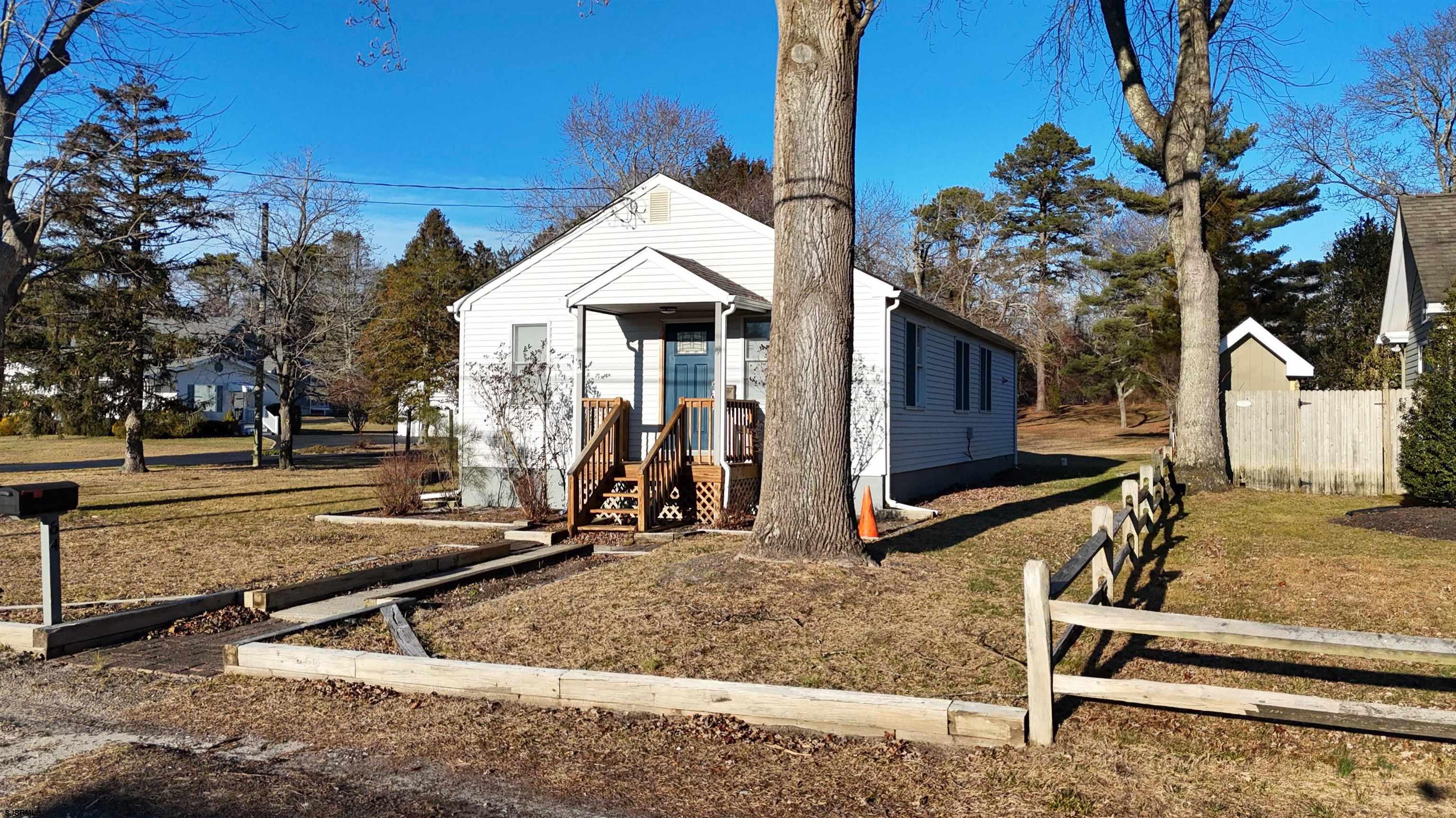 64 Clarks Landing Road Port Republic, NJ 08241 - Photo 33 of 63 a view of a house with backyard and trees