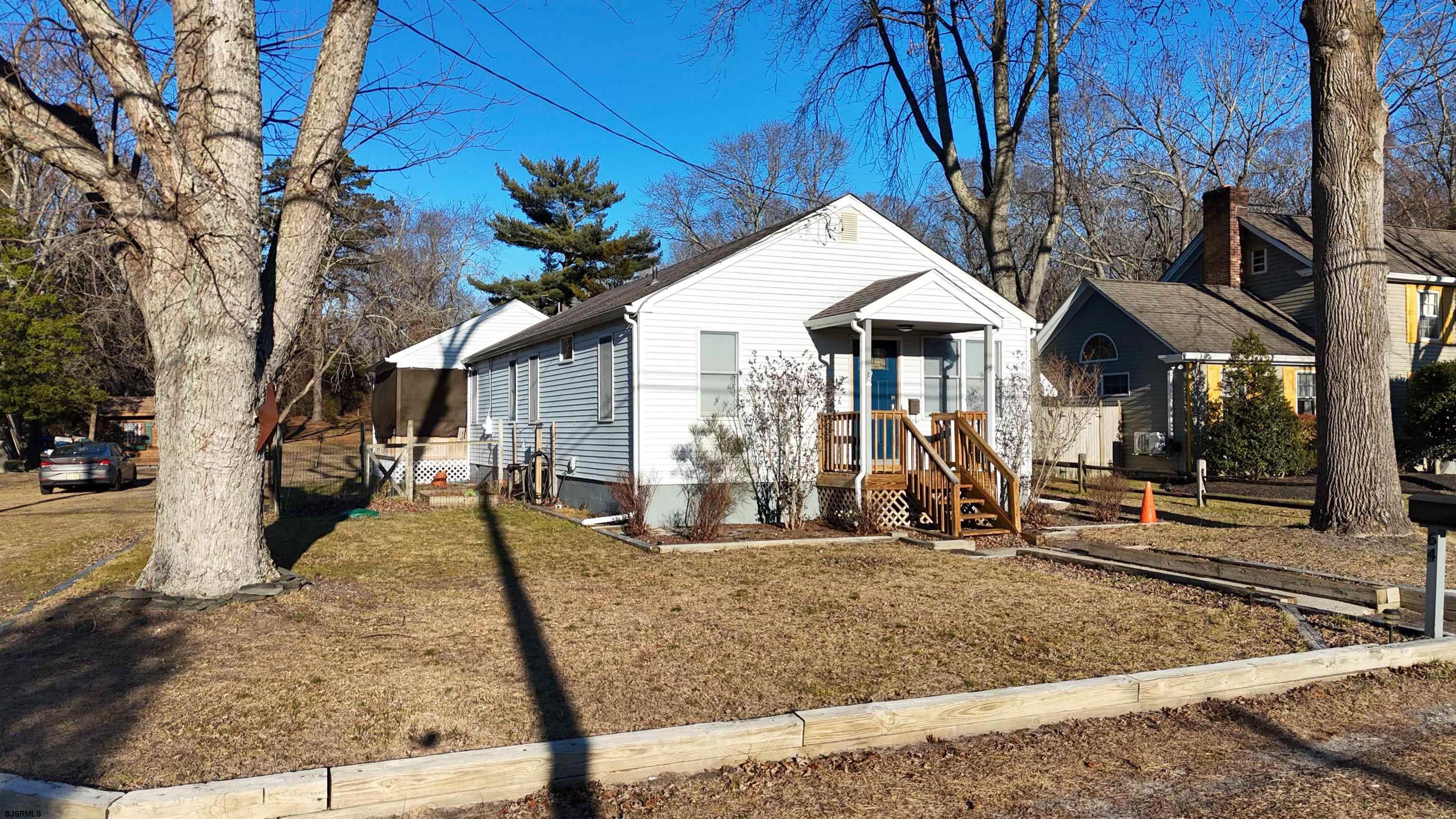 64 Clarks Landing Road Port Republic, NJ 08241 - Photo 34 of 63 a front view of a house with a porch