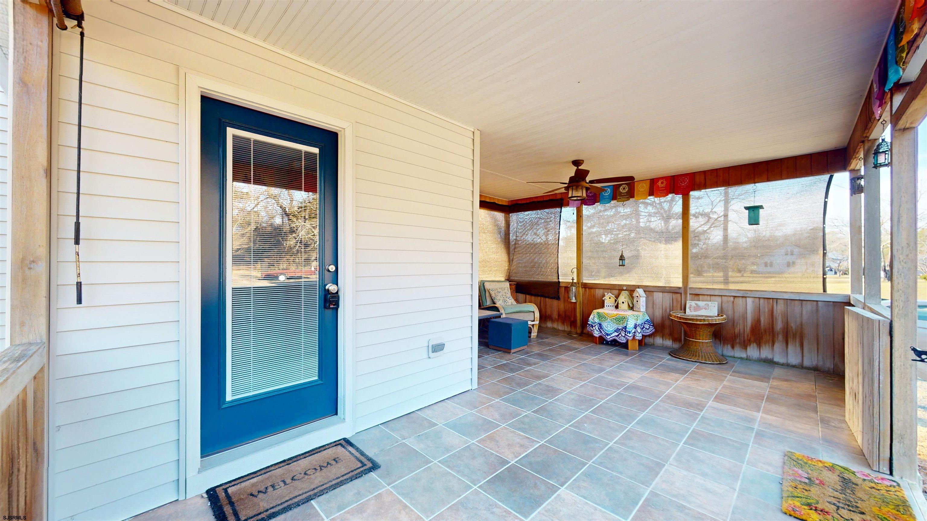 64 Clarks Landing Road Port Republic, NJ 08241 - Photo 4 of 63 a view of an outdoor space with porch and furniture