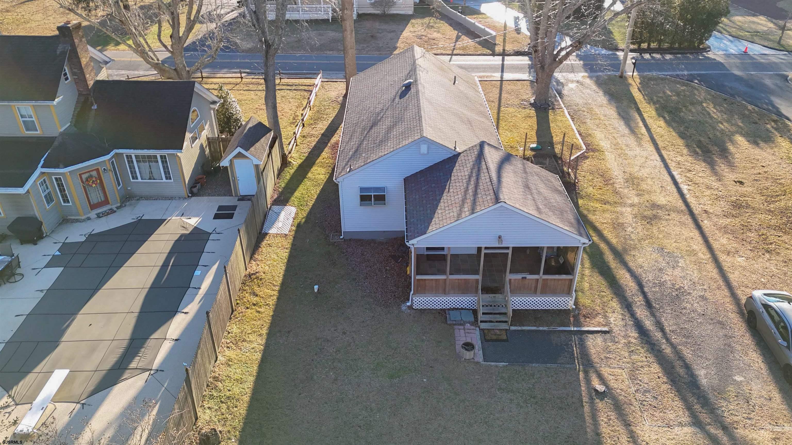64 Clarks Landing Road Port Republic, NJ 08241 - Photo 42 of 63 a balcony with table and chairs