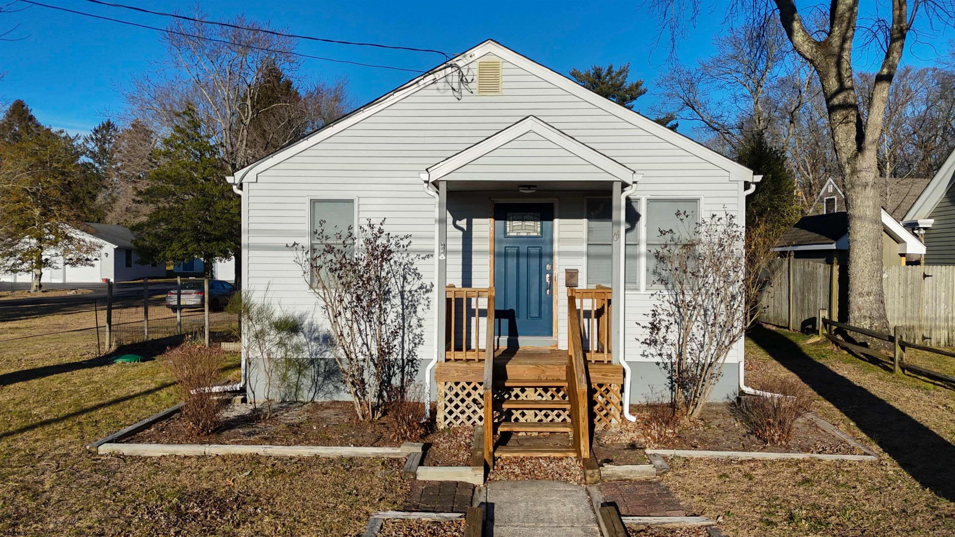 64 Clarks Landing Road Port Republic, NJ 08241 - Photo 46 of 63 a front view of a house with garden