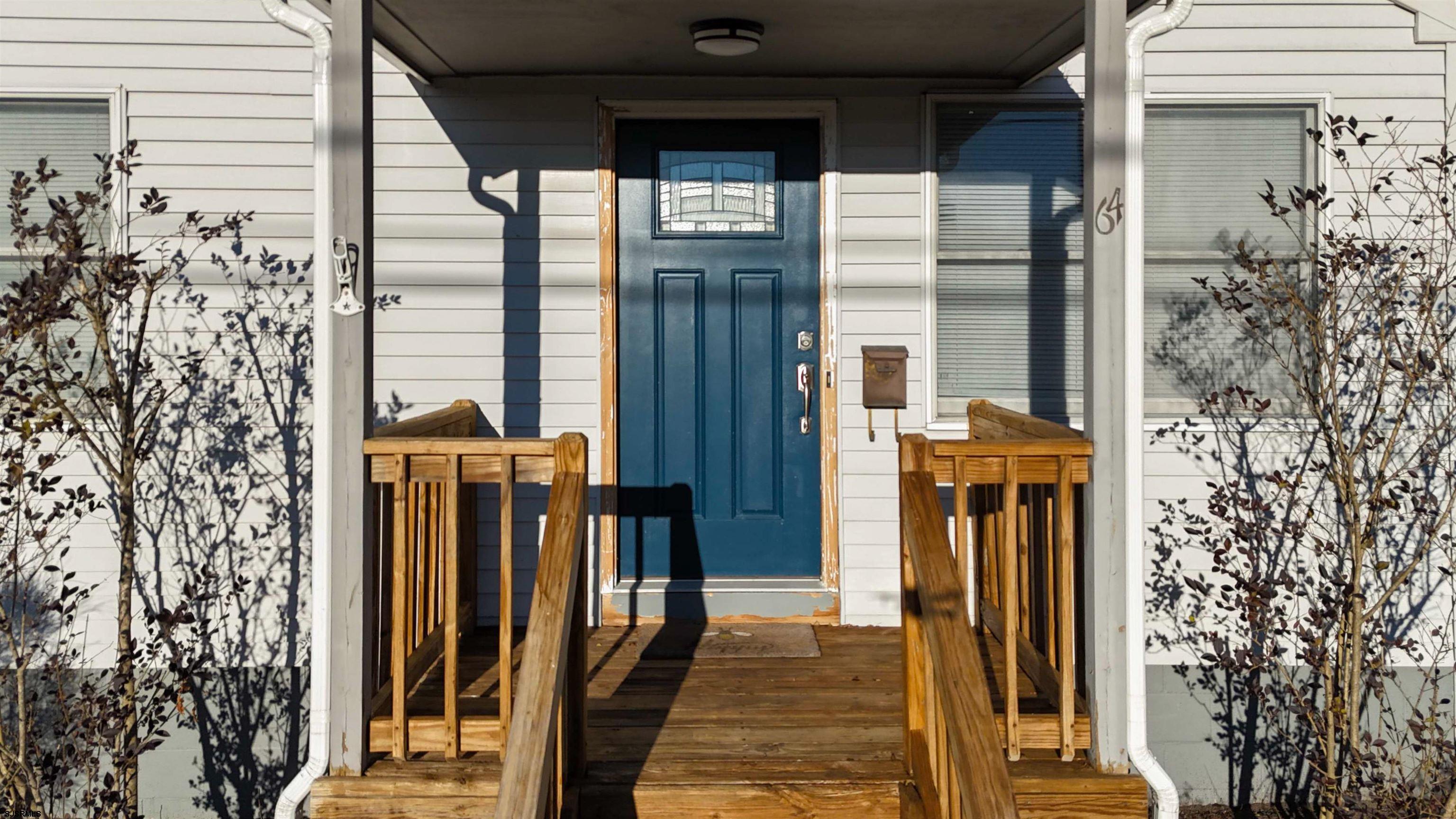 64 Clarks Landing Road Port Republic, NJ 08241 - Photo 47 of 63 front view of a house with a porch