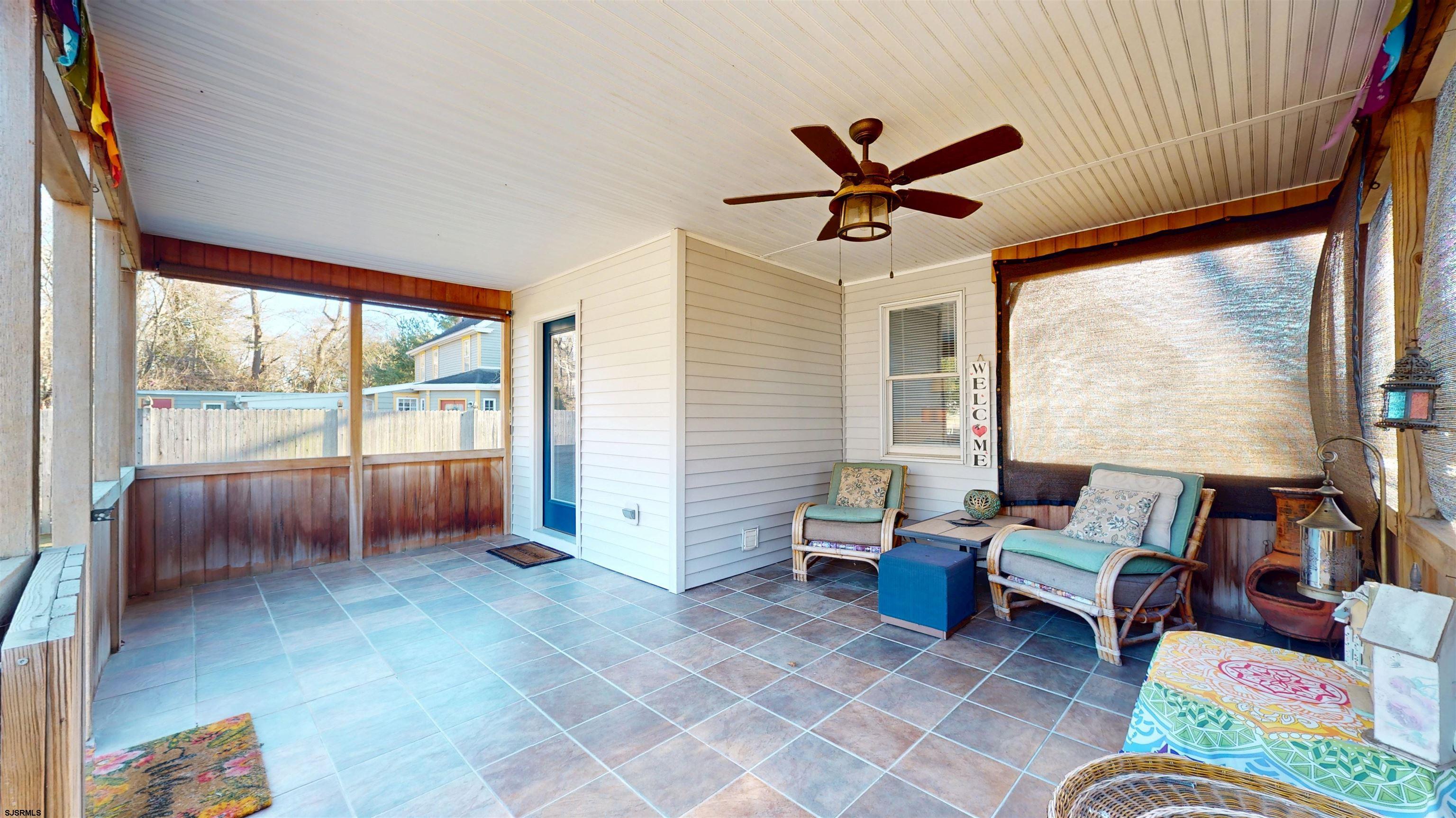 64 Clarks Landing Road Port Republic, NJ 08241 - Photo 5 of 63 a living room with furniture and a large window