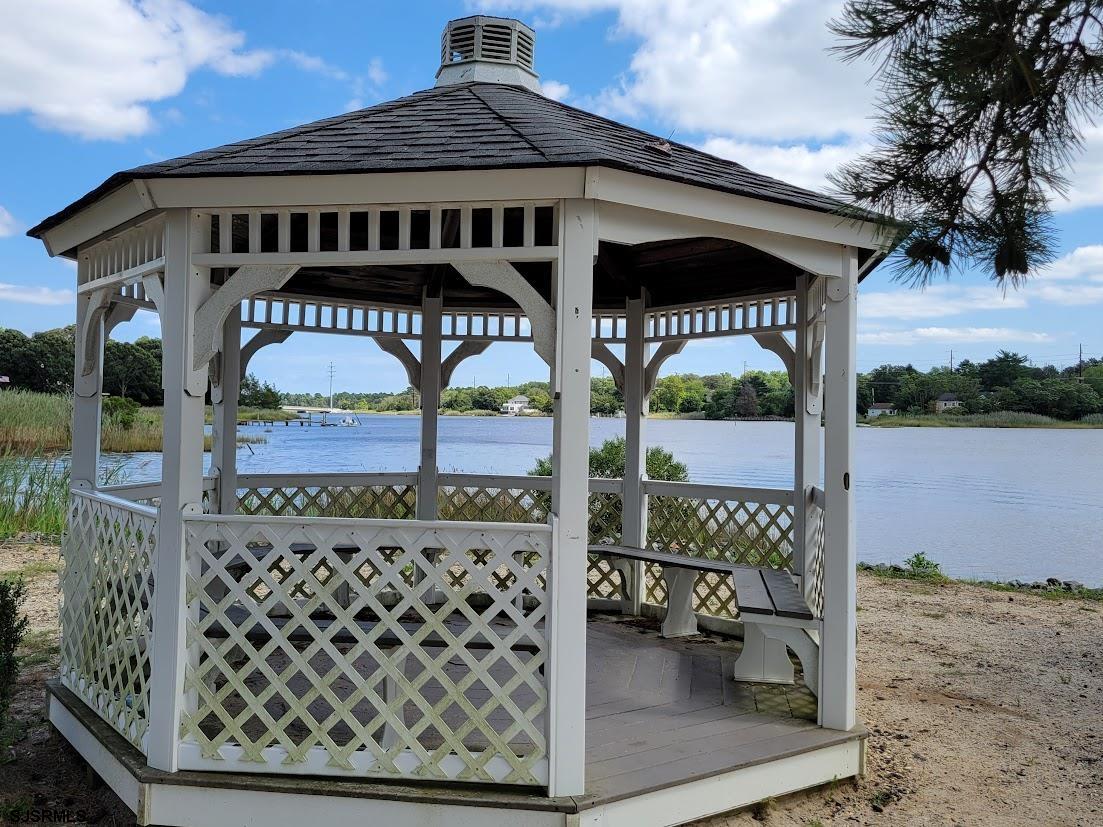 64 Clarks Landing Road Port Republic, NJ 08241 - Photo 57 of 63 a front view of a house with a yard
