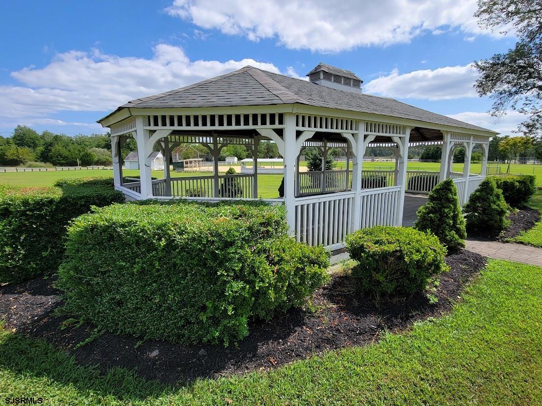 64 Clarks Landing Road Port Republic, NJ 08241 - Photo 59 of 63 a view of a house with garden and pathway