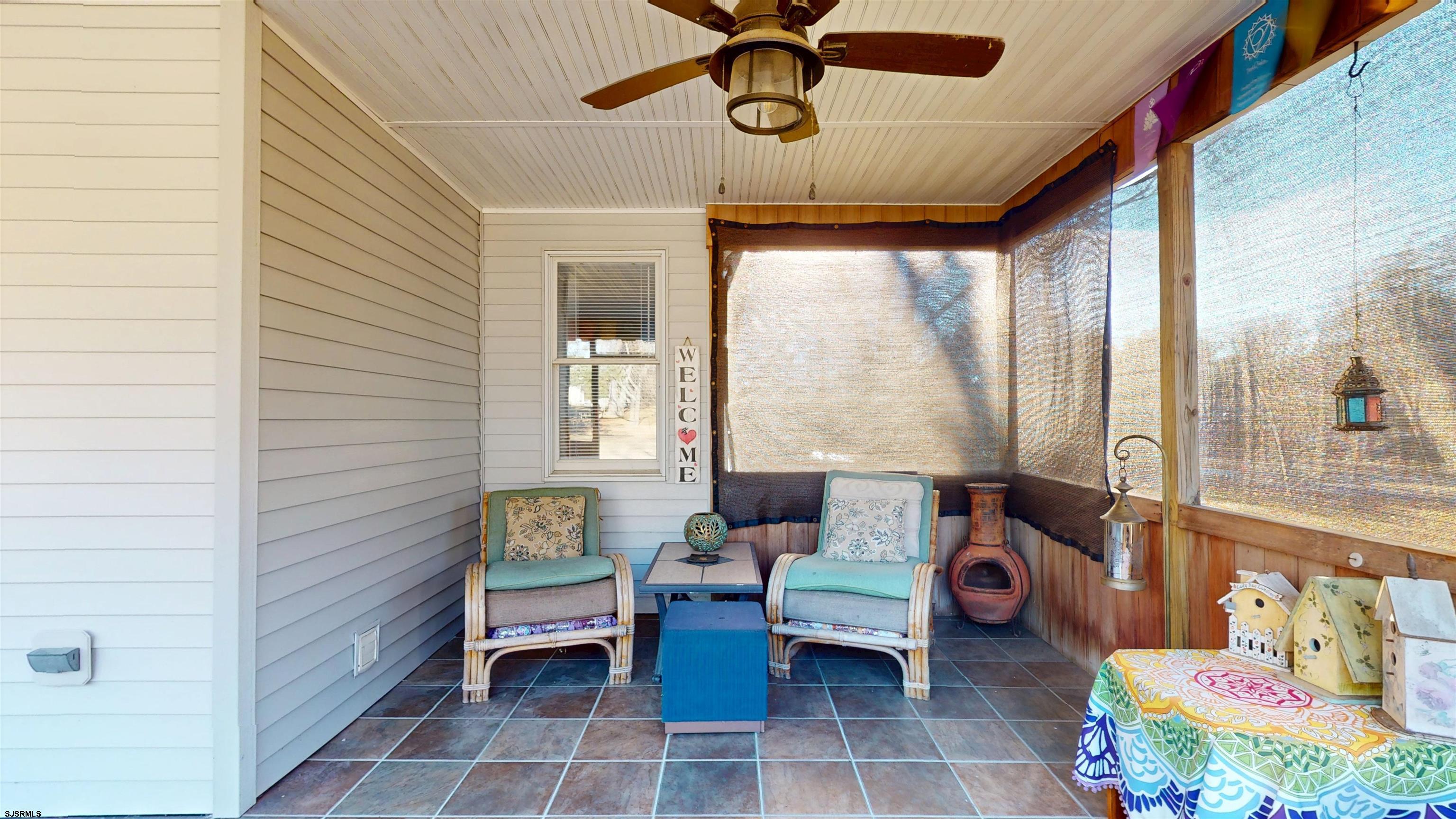 64 Clarks Landing Road Port Republic, NJ 08241 - Photo 7 of 63 a living room with furniture and a window