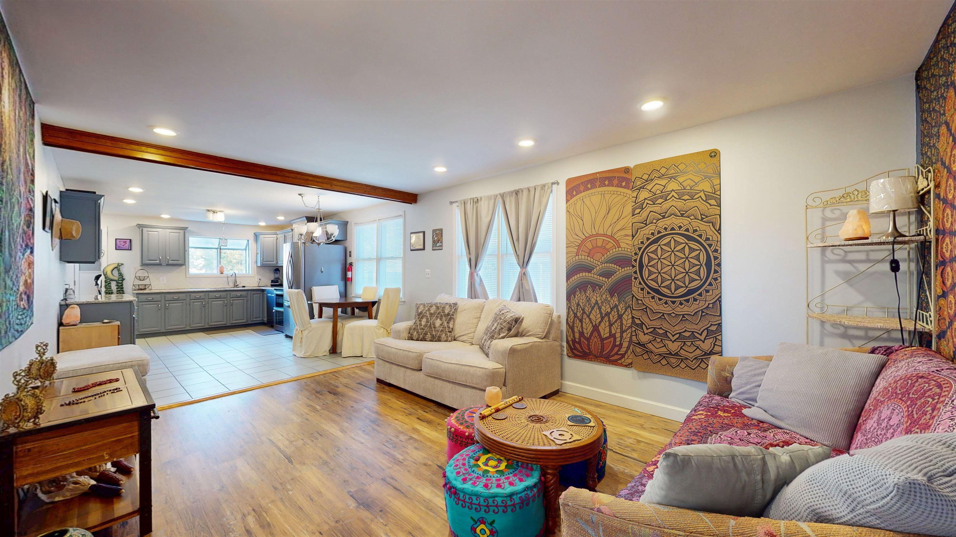 64 Clarks Landing Road Port Republic, NJ 08241 - Photo 9 of 63 a living room with furniture and a wooden floor
