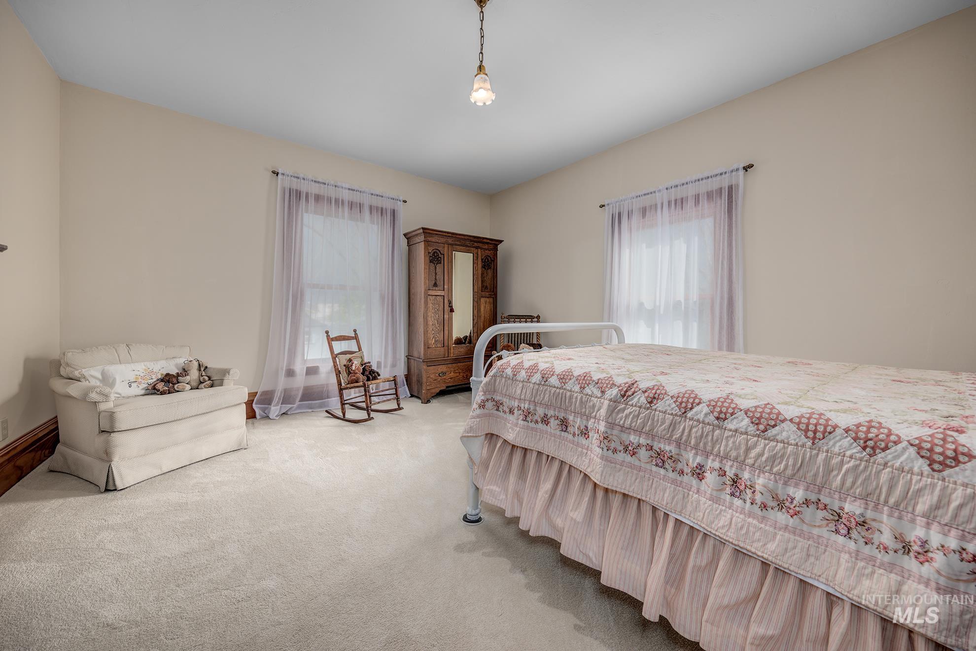 548 West 2nd Street Weiser, ID 83672 - Photo 23 of 50 View of carpeted bedroom