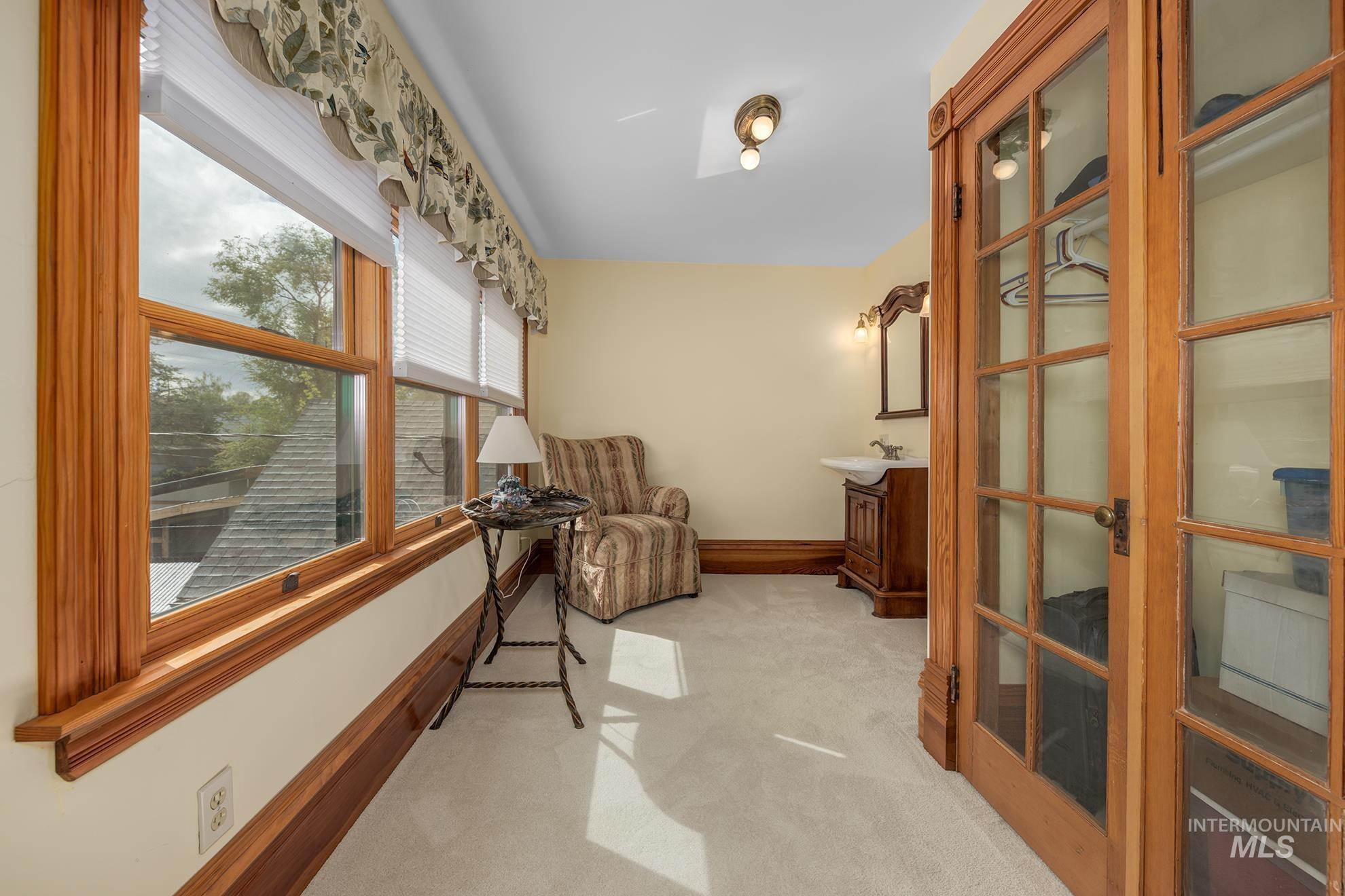 548 West 2nd Street Weiser, ID 83672 - Photo 25 of 50 Corridor with light carpet and baseboards