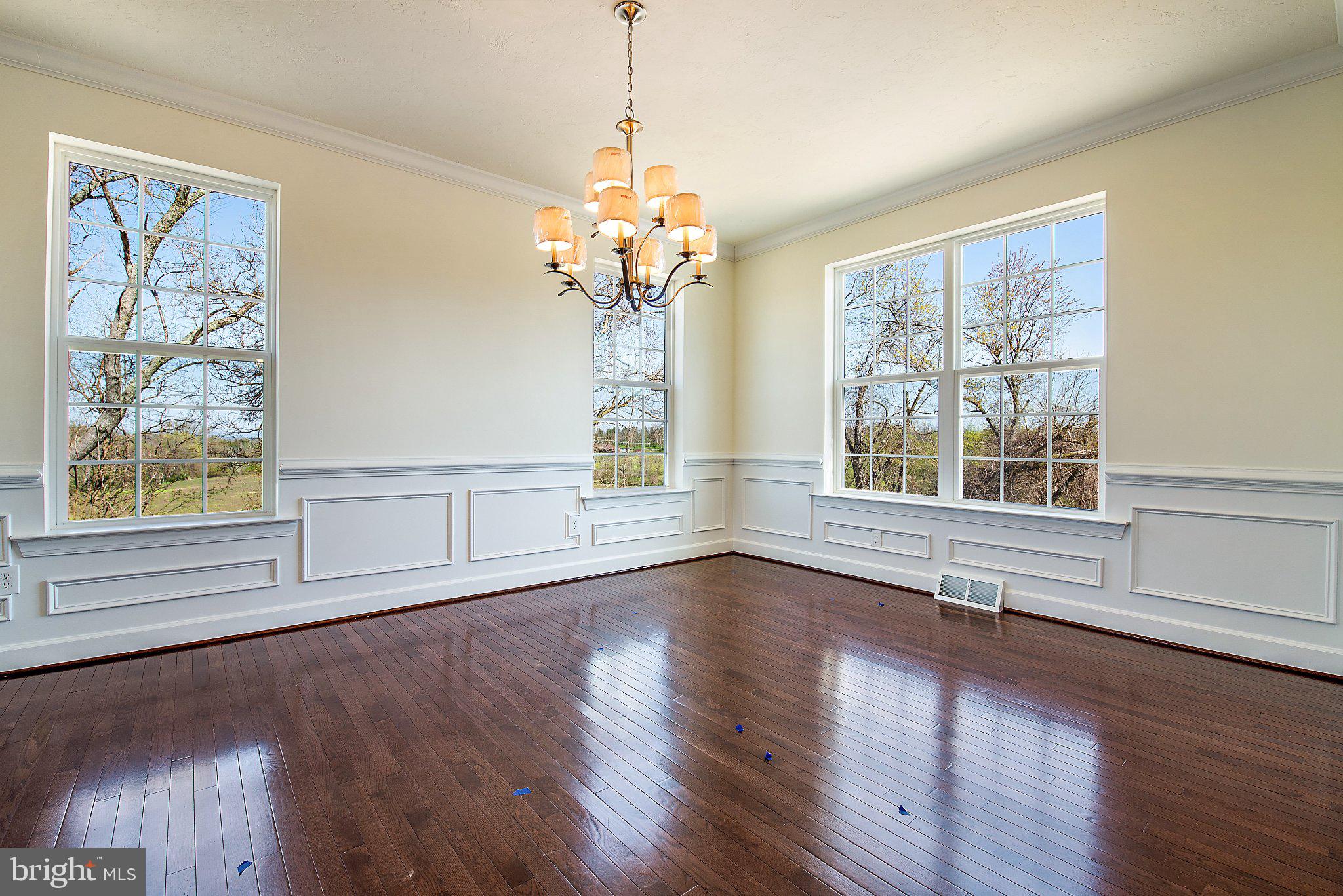 53 Bright Lane Hanover, PA 17331 - Photo 5 of 21 a view of an empty room with wooden floor and a window