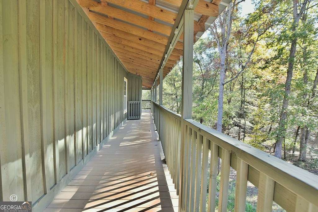 3175 Salem Road Pine Mountain, GA 31822 - Photo 15 of 41 a view of a balcony with wooden fence and floor