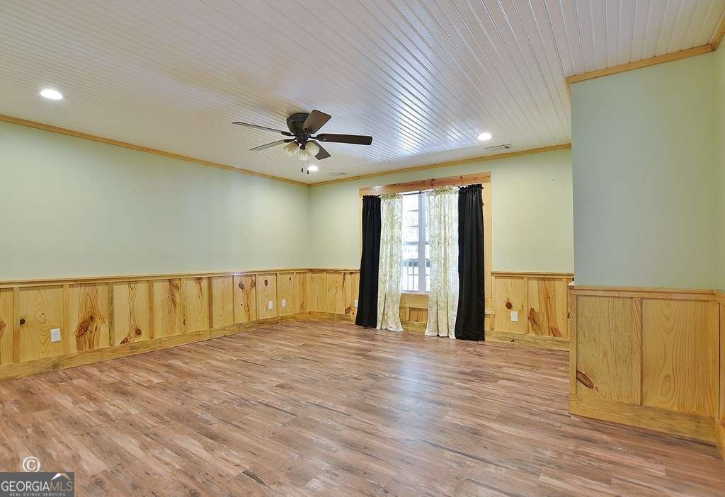 3175 Salem Road Pine Mountain, GA 31822 - Photo 28 of 41 a view of an empty room with window and wooden floor
